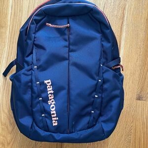 Patagonia Refugio Daypack 26L Navy Backpack with Pink Accents